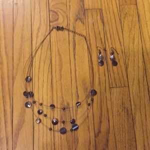 Matching purple earrings and necklace